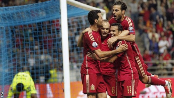 Spain celebrate a goal against Slovakia