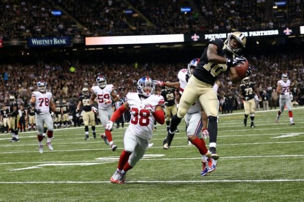 The Giants defense struggles against the Saints.